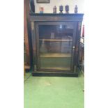 Black display cabinet with inlay and gold decoration