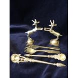 Pair of white metal incense holders in the shape of deer, and other white metal items.