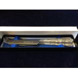 Pair of modern silver handled cheese knives in original box