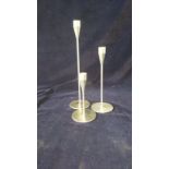 3 x stainless steel Piet Hein candle stick holders.