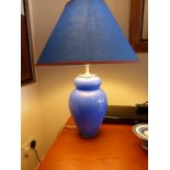 A pair of cobalt blue, urn shaped table lamps.