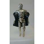 Vintage Star Wars figure "C3PO" with removable limbs and black sack. Complete.