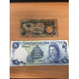 Vintage bank notes a one dollar bill from the Cayman Islands and a five shillings note from the Bank
