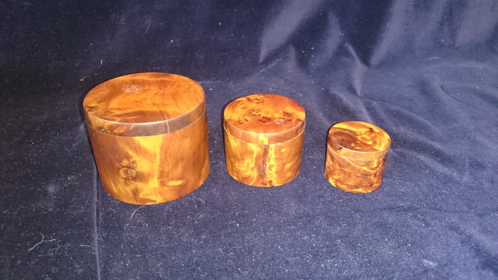 Three nesting Yew miniature round boxes