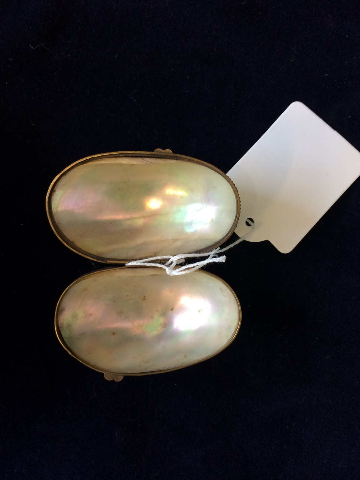 A mother of pearl Victorian trinket box, brass mounts.