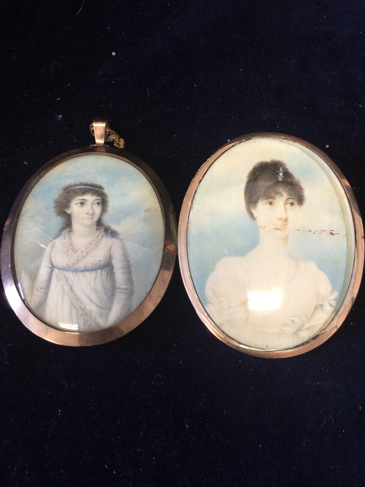 A pair of beautiful Mourning miniatures, both with hair and one in need of having the glass