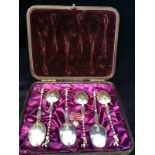 A Boxed set of ornate silver apostle spoons