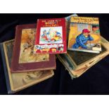 A selection of vintage books including several issues of The Wonder Book and The Home University