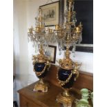 A pair of lovely blue and gilt with cut glass table chandeliers. Conversion has been done but