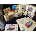 A box of twelve assorted boxed Corgi cars and lorries