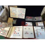 A stamp collection featuring UK stamps both pre and post decimal, and stamps from around the world