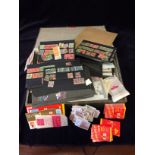 A large volume of mint stamps in presentation packs, and booklets