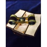Two sets of opera glasses