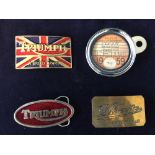 Three motorcycle themed belt buckles and a tax disk holder with a 1959 dated Velocette tax disc