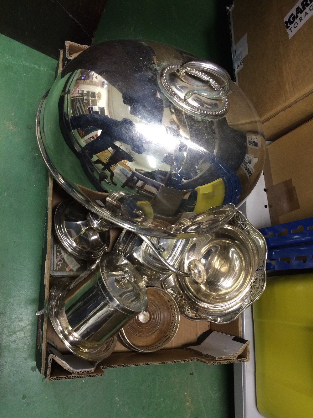 A selection of silverplate items to include domed place covers