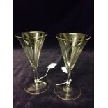 A pair of Regency champagne hand blown toasting glasses C1820/1830's