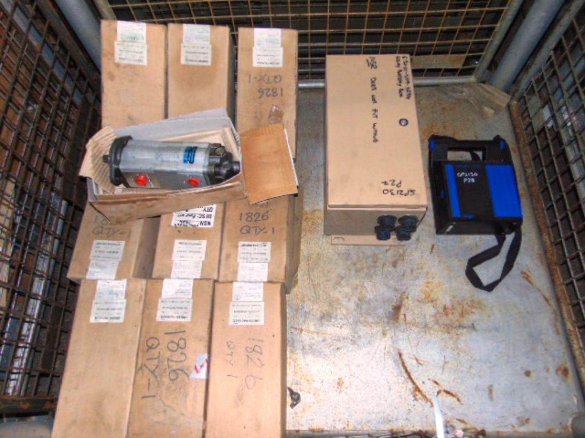 Mixed Stillage Consisting of 10 x Supacat Hydraulic Pumps, Battery Relay Box and Battery Charger