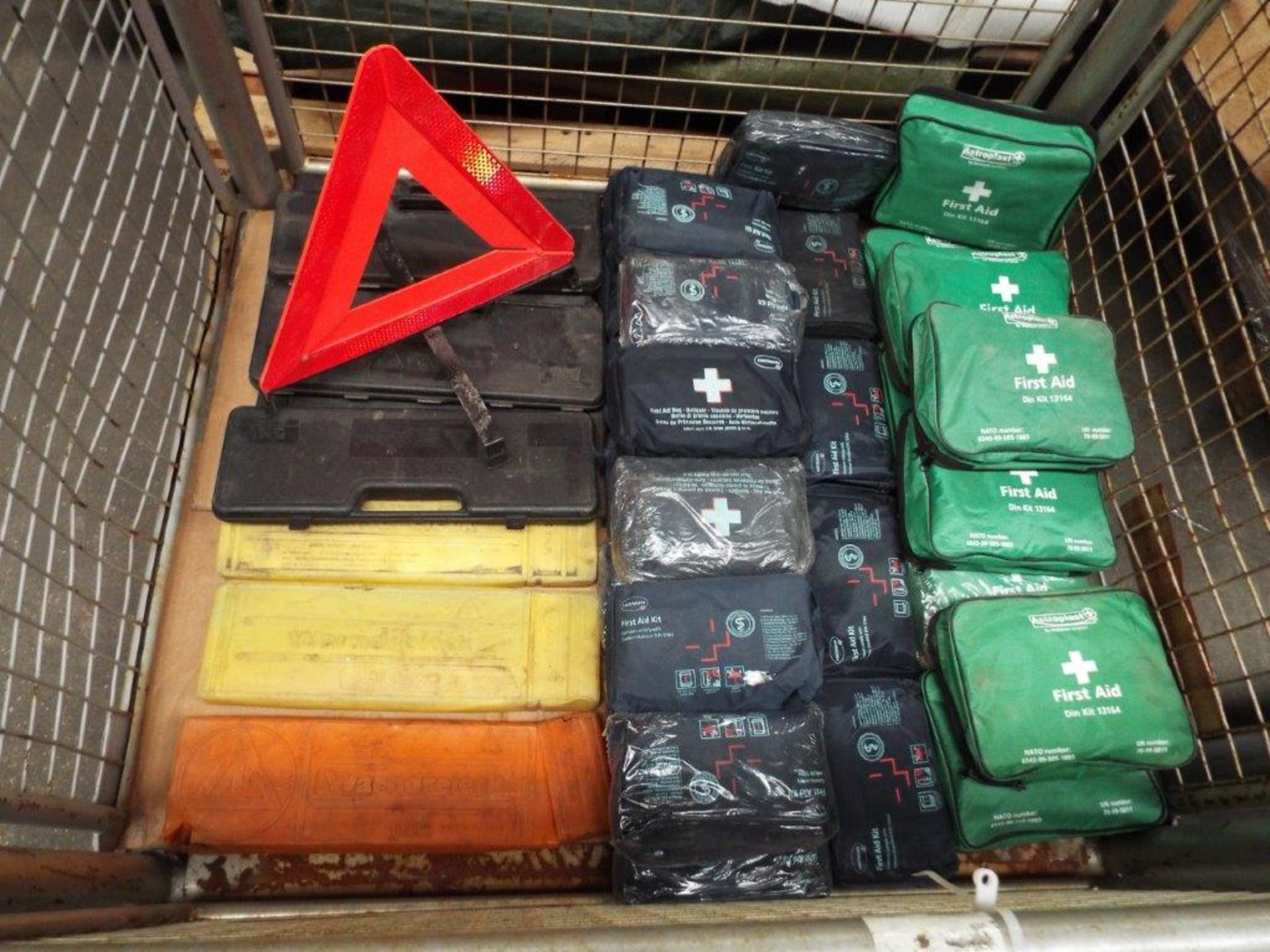 Mixed Stillage of First Aid Kits and Warning Triangles