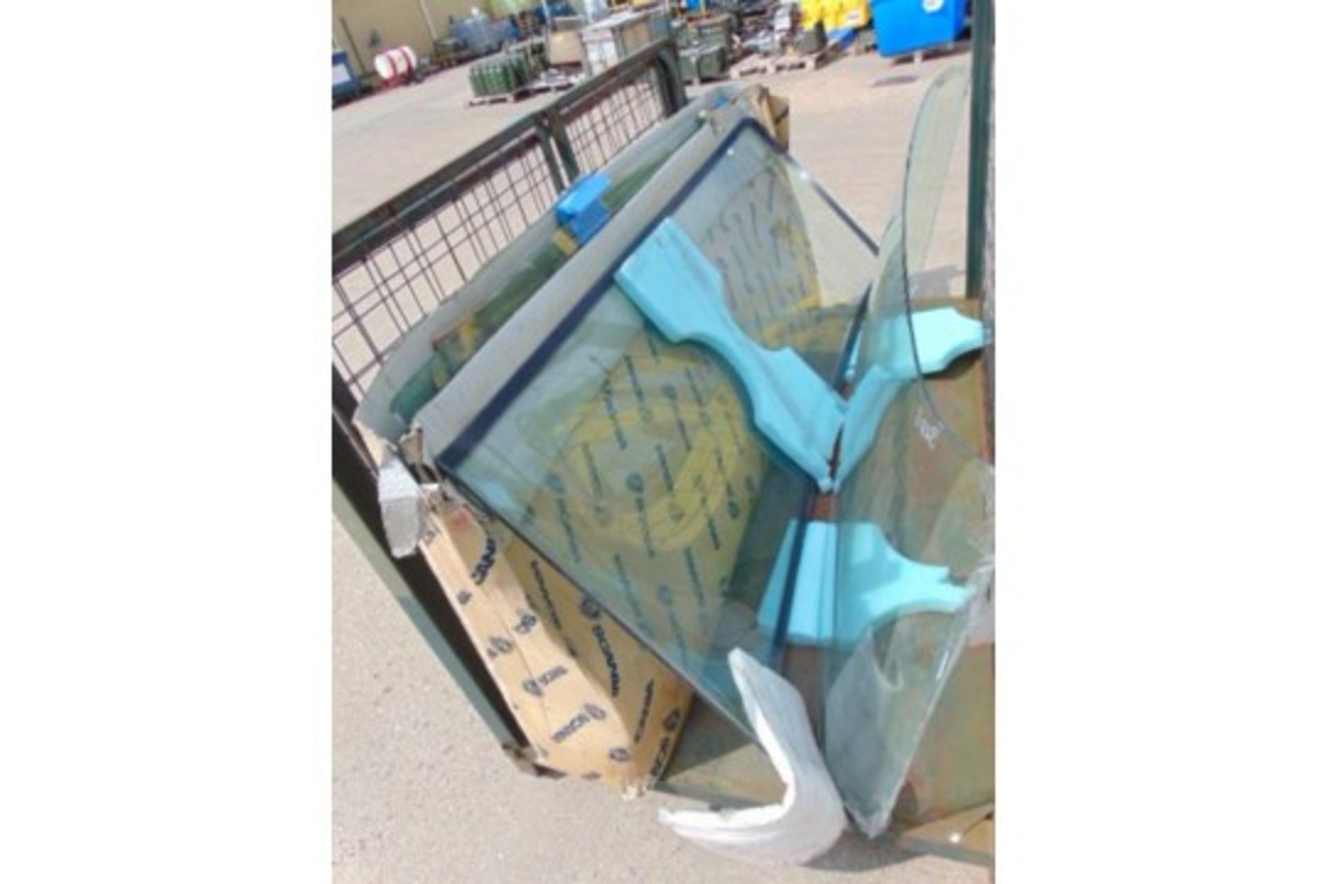 Stillage of 4 x Scania Series 4/5 Windscreens