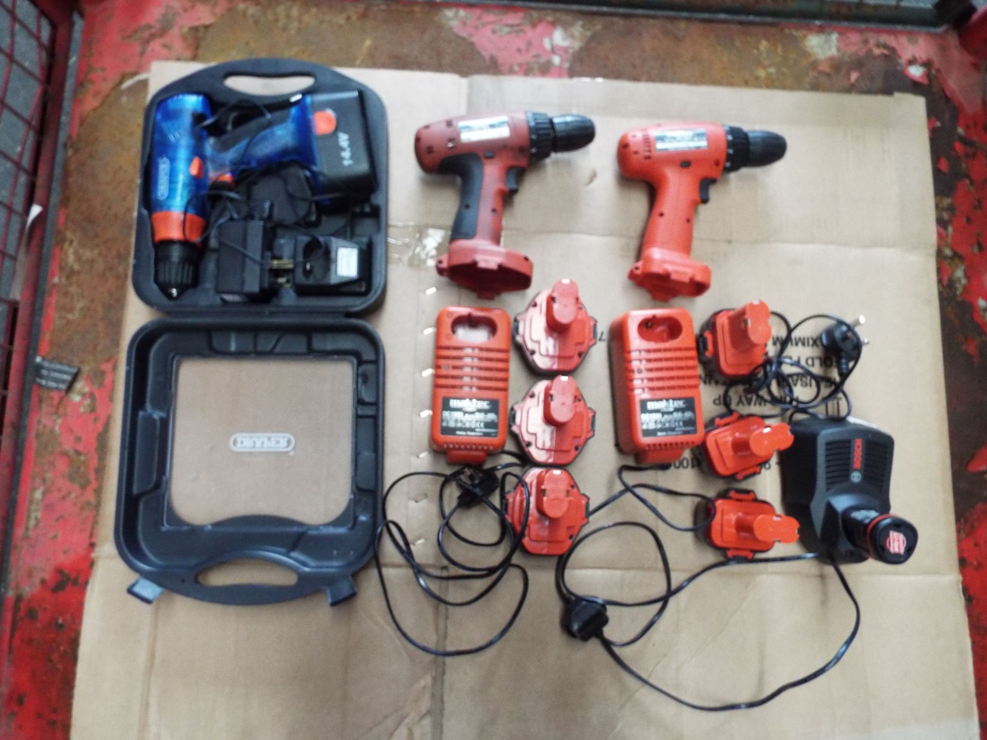 Mixed Stillage of Power Tools consisting of Drills, Batteries and Chargers