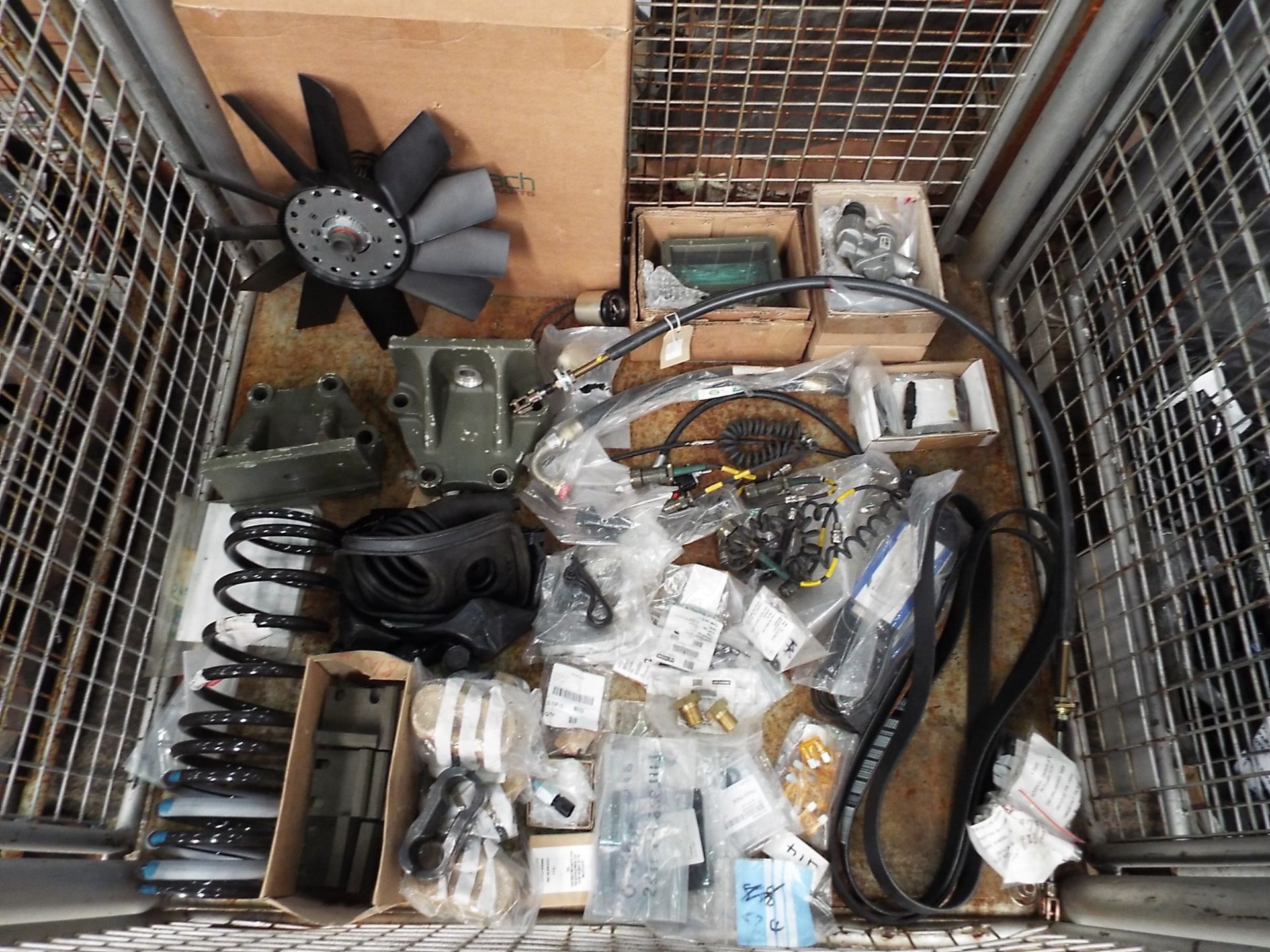 Mixed Stillage of Fighting Vehicle and Wolf Spares inc Wiring Harness', Clips, Fan, Belts etc