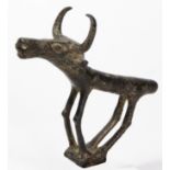 A possibly Luristan bronze pole section or terminal 
The stylised abstract horned ox modelled with