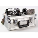 A Leica M3, circa 1957
Serial number 857634, chrome with a Leitz Elmar F-5cm 1.3.5 lens number