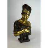 After Joseph Chinard (French, 1756-1813)
A patinated and gilt bronze bust of Madam Recamier, late