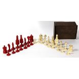 A Staunton type ivory and stained chess set
Comprising one full set of ivory pieces, the second