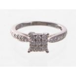 A 9ct white gold diamond set dress ring 
Set with nine round brilliant cut diamonds in a square