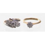 Two 18ct gold diamond set rings
The first having a single round brilliant cut diamond of an