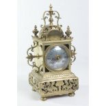 A French cast brass eight day mantel clock
With a 8cm convex dial with Roman numerals the two train