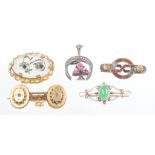 Four assorted Victorian and later brooches
To include a circa 1880-1890 diamond set bar brooch, a