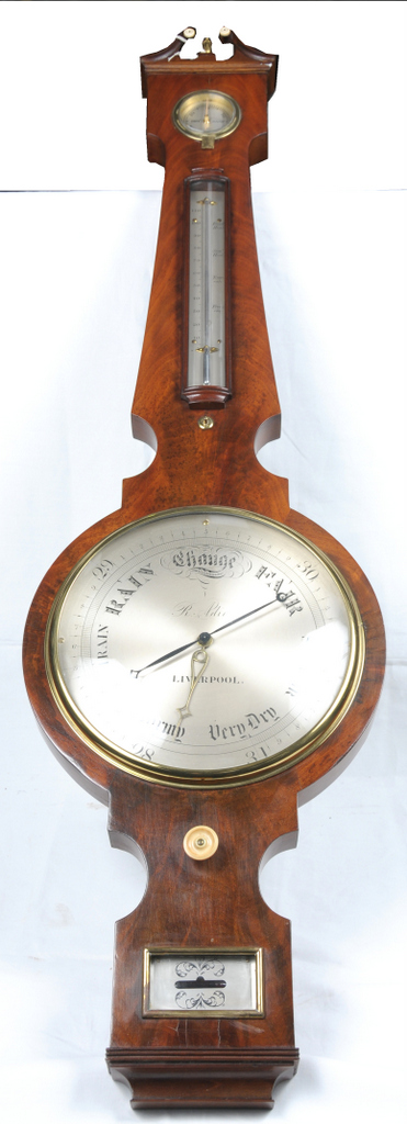 A George IV mahogany wheel barometer
With a 25cm silvered register signed R Adie, Liverpool above a