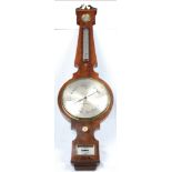 A George IV mahogany wheel barometer
With a 25cm silvered register signed R Adie, Liverpool above a
