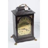 A stained wood bracket clock 20th Century reproduction
With a 17cm brass dial signed Hutt of