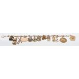 A 9ct fancy curb link charm bracelet
Variously set with thirteen 9ct and unmarked gold charms to