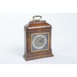 An Elliott walnut cased mantel clock
With a 9cm silvered dial, by Boodle & Dunthorne, Liverpool the