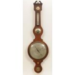 An early 20th Century mahogany cased wheel barometer
With a 25cm silvered register above a