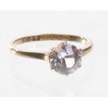 An 18ct gold white sapphire set solitaire ring
The round old cut white sapphire of approx 7mm