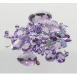 A quantity of loose amethysts
In a variety of cuts to include pear cut, oval mixed cut, cabochon