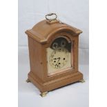 A oak bracket clock, 20th Century
With a 15cm brass dial with subsidiary chime silent and slow fast