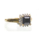 A 9ct gold sapphire and diamond set cluster ring
The square sapphire of approx 5x5mm, claw set to