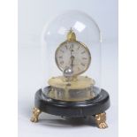 A Rotary pendulum clock
With a 6cm dial with Roman numerals, stamped with patent dates 1853 in the