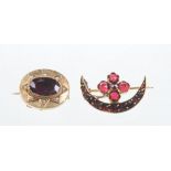 A mid 19th Century almandine garnet and split pearl set brooch
The central oval cut almandine