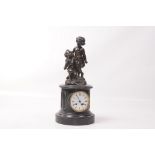 A choice 19th Century black marble and figural bronze mantel clock
With a 10cm white dial with