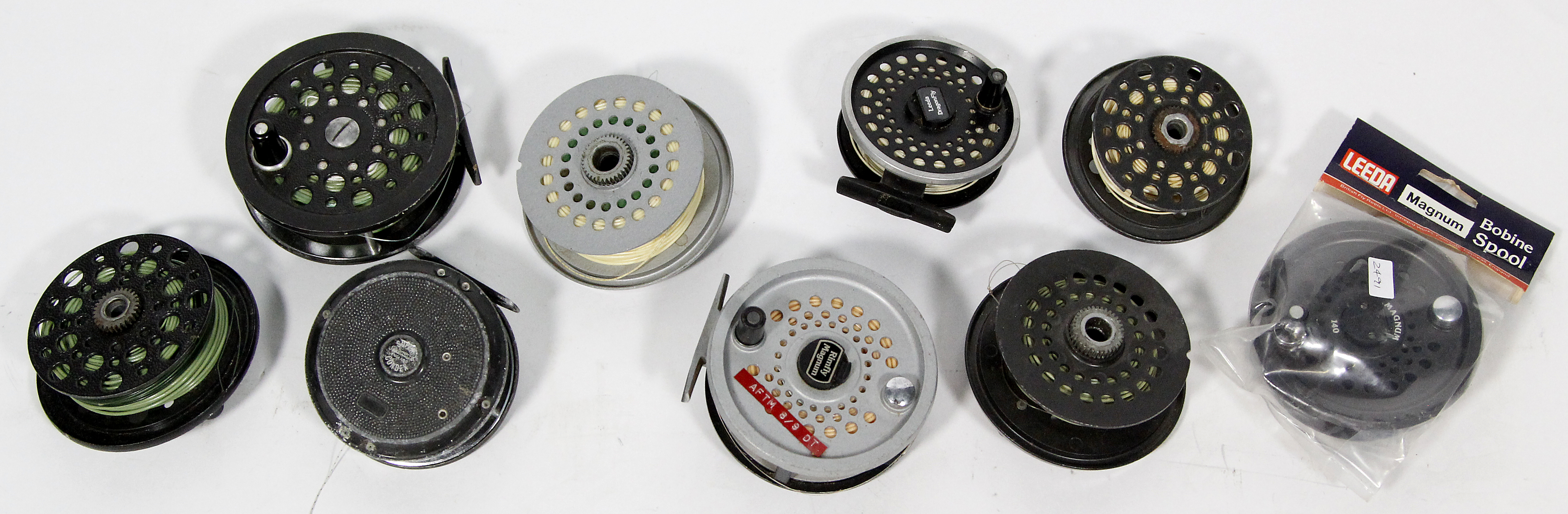 Four assorted fly fishing reels