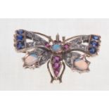 A multi gem set butterfly brooch, early 20th Century
A pierced openwork wings, set with diamonds,