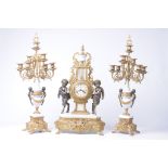 A Louis XV style clock garniture, 20th Century
The clock with 9cm white dial,