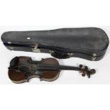 A late 19th/early 20th Century Bavarian violin having carved lion head scroll
With two piece